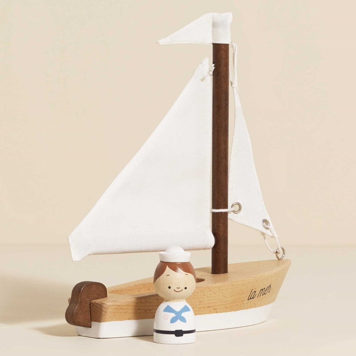 Wooden Sailing Boat and Captain